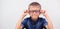 Banner little boy with glasses correcting myopia close-up portrait Ophthalmology problem selective focus