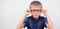 Banner little boy with glasses correcting myopia close-up portrait Ophthalmology problem selective focus