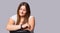 Banner- long format, gray background. Indoor image of charming positive overweight young Caucasian female relaxing