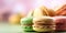 Banner macarons cookies, different colors, blurred background, colourful macaroons bisquits close-up