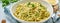 Banner with pesto pasta, bavette with walnuts, parsley, garlic, nuts, olive oil. Side view, long side, blue background.