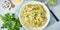Banner with pesto pasta, bavette with walnuts, parsley, garlic, nuts, olive oil. Top view, long side, blue background