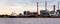 Banner of petroleum oil refinery plant beside river in twilight time