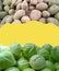 Banner with pile of cabbage and potato isolated on illuminating yellow background. Vegetables advertising. Grocery shopping. Fresh