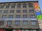 Banner in polish `Centenary of joining part of Upper Silesia to Poland`on a building in Katowice