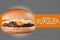 banner sandwich beef burger with cheese and mayonnaise gray texture background with orange stripe and space for text