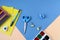 Banner-school supplies: pencils. notebooks, scissors, pens, notebooks, paint - on a blue background, top view, close - up-the