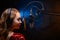 Banner. Vocalist sings in the studio. Practice and school of vocal. Music and teaching. Effective photo with blue and orange smoke