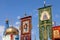 Banners, flags, icons of the Orthodox Church against the blue sky and the domes of the temple