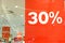 Banners With Signs Advertising Sale 30%, 50% in clothes store at Shopping Mall