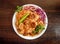 Bannu beef pulao rice with salad, onion and cabbage served in plate isolated wooden background top view indian spices and