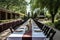 banquet hall, with long tables set up for a formal outdoor dining event