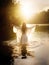 Baptism. Beautiful young woman in a white dress, standing in water in the rays of sun