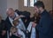 Baptism ceremony at local church, holly water at small boy