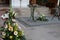 Baptismal celebration inside a Christian church with flowers