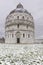 The baptistery of Piazza dei Miracoli after a snowfall, Pisa, Tuscany, Italy