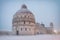 Baptistery of Pisa after a winter snowfall. Square of Miracles a