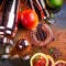 Bar accessories, drink tools and cocktail ingredients on rusty stone table. Flat lay style