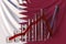 Bar chart with downward trend against flag of Qatar. Financial crisis or economic meltdown related conceptual 3D