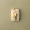 Bar of handmade soap with camomile flowers over green pastel grunge background