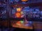 Bar interior with moody lighting and neon signs at night