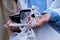 Bar Mitzvah boy holding tzitzit during Jewish prayer