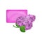 Bar of purple hygienic soap and flowering branch of lilac. Refreshing spring smell. Natural product for skin care