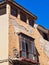 Bar Window on Historic Stucco House, Segovia, Spain