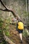 Baracoa, Cuba - 01/12/2017: Hikers climbing up on a mountain through lush forest