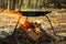 Barbecue brazier and bonfire in forest