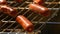 Barbecue browned sausages on the hot grill, turn