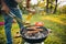 Barbecue. Croppe image of man flipping grilled sausage