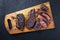 Barbecue dry aged wagyu Brazilian picanha steaks sliced on a wooden board