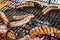Barbecue grill bbq on coal charcoal grill with steaks bratwurst sausages and meat delicious summer meal