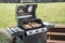 Barbecue grill bbq on propane gas grill steaks bratwurst sausages meat meal