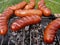 Barbecue grill & sausages - close view