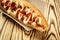 Barbecue Grilled Hot Dog with sauce,Hot Dog With Yellow Mustard,Onion,Pickles and French Fries,Tasty hot-dogs with vegetables on