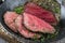 Barbecue Wagyu Sirloin Steak sliced on an Iron cast pan