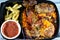 Barbecued chicken with long basmati rice and french fries, beef meat barbecued oriental tarb Kofta served with tomato dakos sauce
