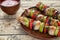 Barbecued marinated turkey or chicken meat shish kebab skewers