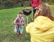 Barbecues are the best. Shot of a family enjoying a barbecue outside.