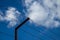 Barbed wire on the background of the cloudy sky. The concept of border closure, prison or loss of freedom