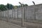 Barbed wire electric fence