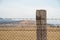 Barbed wire entanglement with wooden post