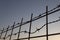 Barbed wire at sunset