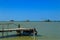 Barbell fishing shed or fishing hut at the river mouth