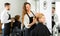 Barber combing hair in salon