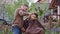 Barber man have a fun time with a small boy make a hair cut charismatic small boy make a funny face and feeling relaxed