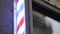 A barber's pole, unusual symbol of barbershops