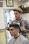 Barber shop, man cuts person hair